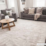 Living room with gray sofa and chairs, light wood table, and Keone Ivory Area Rug. Roomscene-Rectangle