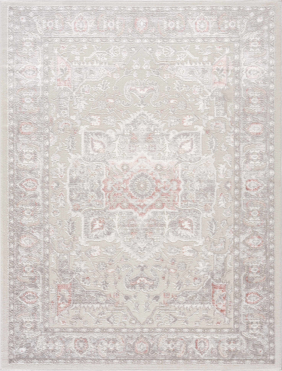 Close-up of the Damla Area Rug. Gray and pink vintage style rug with a traditional, ornate pattern. Design-Rectangle-46