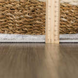 Close-up of the Calum Blue & Gray Area Rug showing the rug's pile height and texture with a ruler and woven basket. Pile