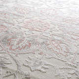 Close-up of the Calum Pink Floral Thick Area Rug, showing the texture and floral pattern details. Texture