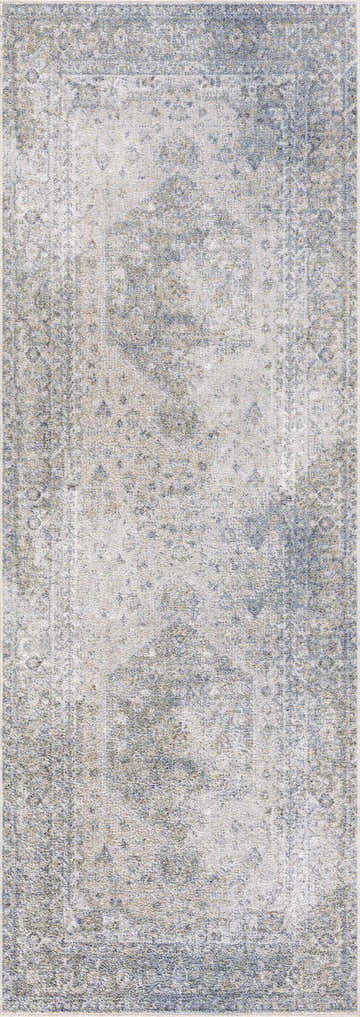 Close-up of the Gael Blue Boutique Washable Rug. Features a vintage style with beige, blue, and tan tones. Design-Runner-2773