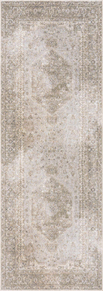 Close-up of the Gael Boutique Washable Rug, featuring a traditional, vintage pattern in light blue, olive, tan, and yellow tones. Design-Runner-2773