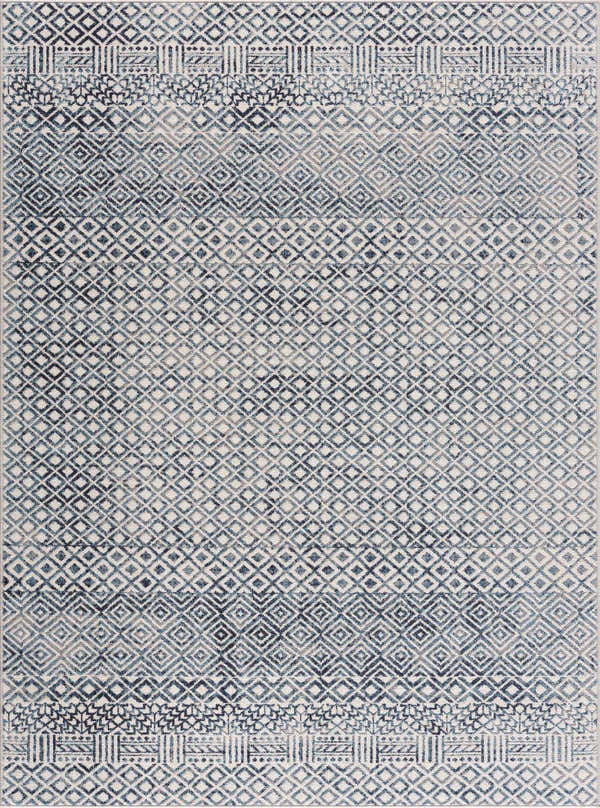 Close-up of the Askeaton Washable Area Rug, showcasing its diamond pattern in blue, gray, and light gray hues. Design-Rectangle-537
