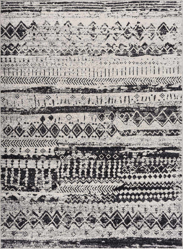 Close-up of the Lyssons Washable Area Rug featuring a black and gray contemporary tribal pattern. Design-Rectangle-537