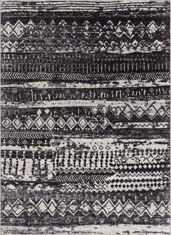 Close-up of the Palali Washable Area Rug. Black, gray, and light gray rug with a contemporary tribal-inspired pattern. Design-Rectangle-537