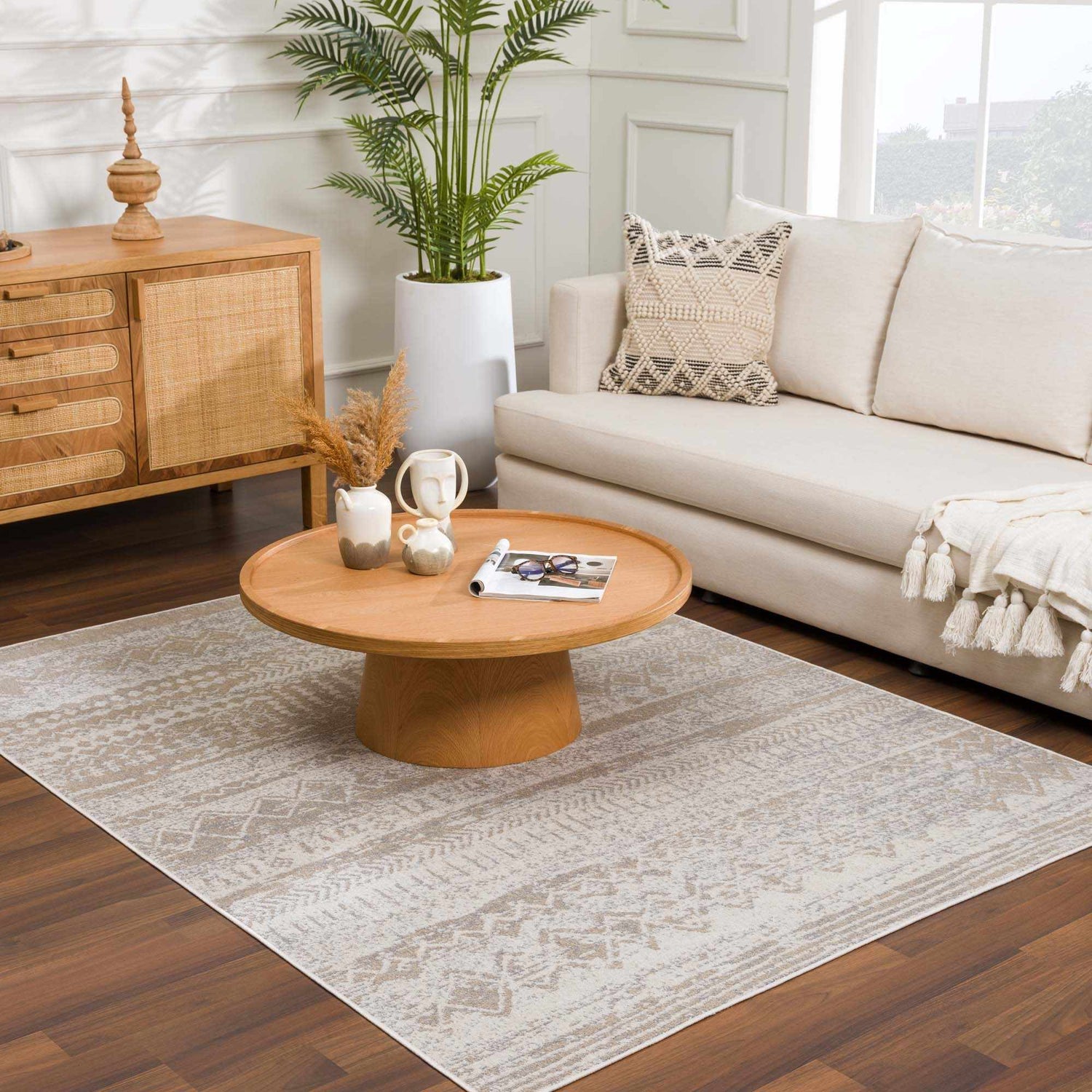 Living room with a cream sofa and Tupsan Washable Area Rug in cream, beige, and gray tones. Modern farmhouse style. Roomscene-Rectangle