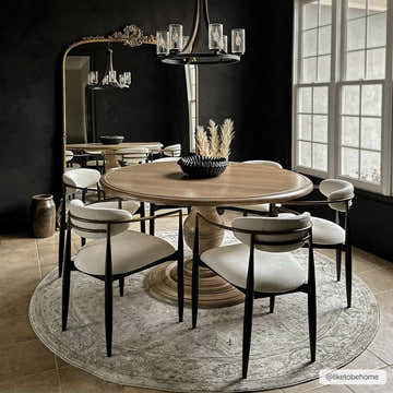 Dining room with round wood table on a round, gray Laughlin Thick Luxe Boutique Rug. Roomscene-Round