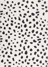 Close-up of the Tariffville Dalmatian Rug, featuring a black and charcoal spot pattern on an off-white background. Design-Rectangle-5373