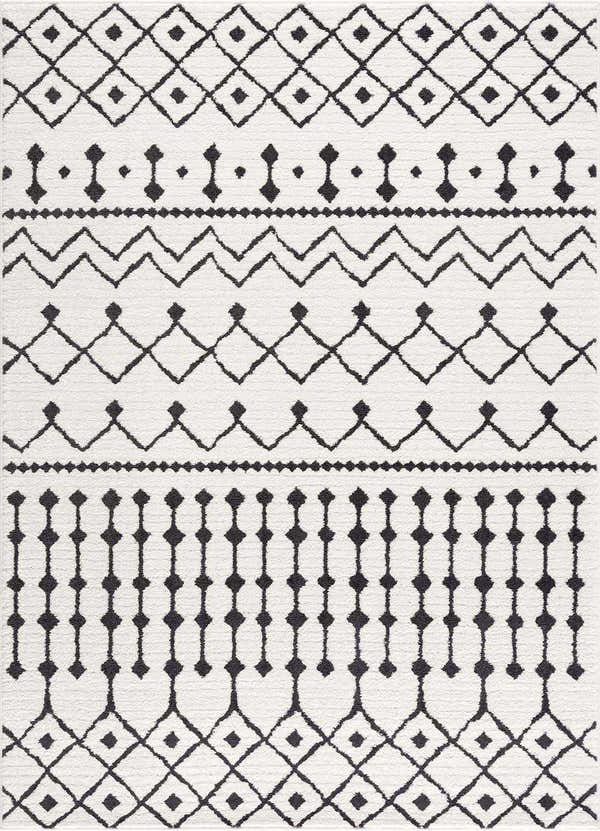 Close-up of the Ringwood Area Rug, a machine woven rug with a black and off-white geometric pattern. Design-Rectangle-5373