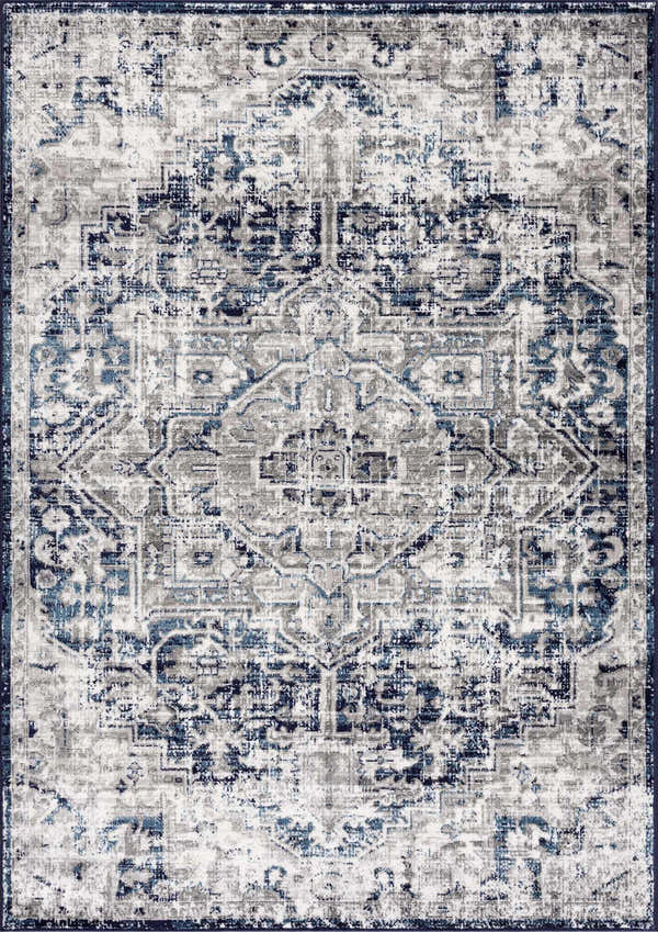 Close-up of the Buenaventura Navy Area Rug, a traditional vintage design in navy blue, gray, and white. Polypropylene, machine woven. Design-Rectangle-46