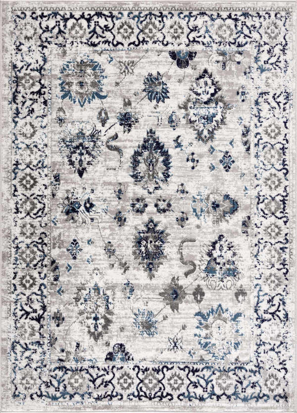 Close-up of the Duena Area Rug: traditional oriental design in blue and light gray, machine woven texture. Design-Rectangle-46