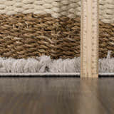 Close-up of the silver gray Andia Gray Area Rug showing shag texture and pile height with ruler. Pile