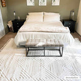 Manyas 3D Bone Area Rug with Tassels