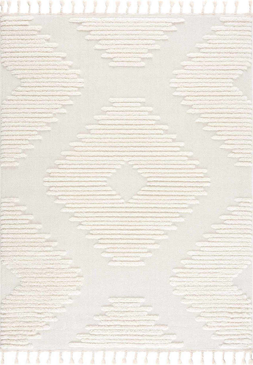 Close-up of the Palimbang Cream 3D Rug featuring a geometric diamond pattern and tassel fringe. Neutral bone and cream colors. Design-Rectangle-537
