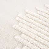 Close-up of the Palimbang Cream 3D Rug showing its bone and cream colors and geometric, textured design. Texture