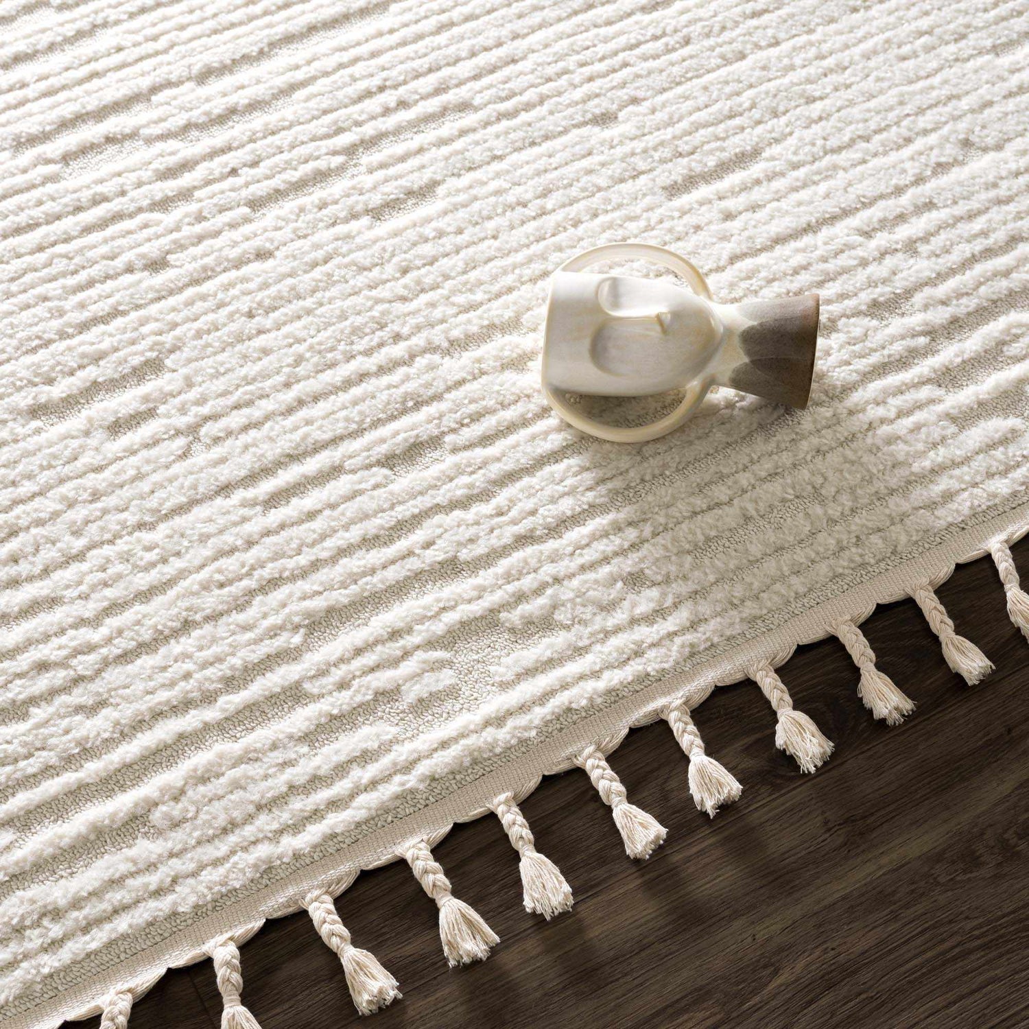 Kulu Textured Area Rug with Tassels