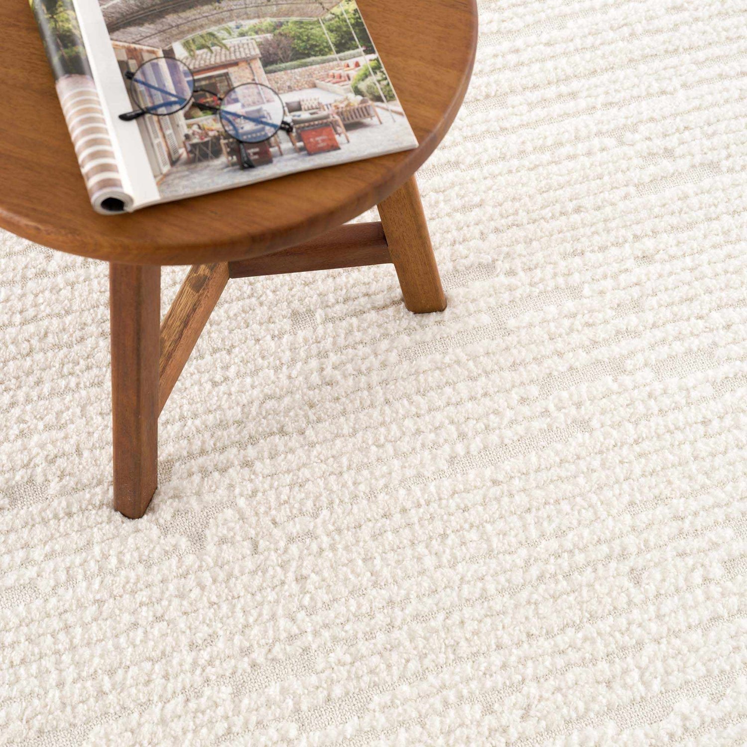 Kulu Textured Area Rug with Tassels