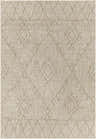 Close-up of the Marwood Brown Nordic Rug; a machine-woven rug with a geometric diamond pattern in light brown and off-white. Design-Rectangle