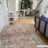 Entryway with Eira Distressed Washable Rug. Farmhouse style with red, blue, and off-white colors. Dining room in background. Roomscene-Rectangle