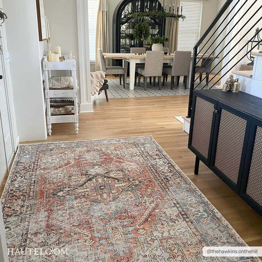 Entryway with Eira Distressed Washable Rug. Farmhouse style with red, blue, and off-white colors. Dining room in background. Roomscene-Rectangle