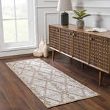Farmhouse entryway with Nyla Bone & Tan Textured Performance Rug, wood console table, lamp, and vases. Roomscene-Runner