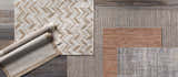 Close-up of Manzanita Area Rug with blue, cream, taupe colors. Contemporary geometric, chevron, and textured patterns. Styleshot