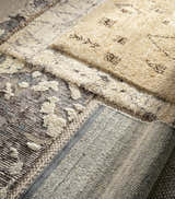 Close-up of Dalaoig Flat Woven Wool Rug showing textures, patterns, and colors: charcoal, cream, denim, light beige, and medium gray. Texture