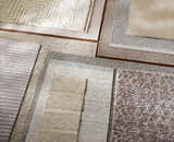 Variety of textures and patterns in neutral-toned wool rugs, including a Dalaoig Flat Woven Wool Rug. Styleshot