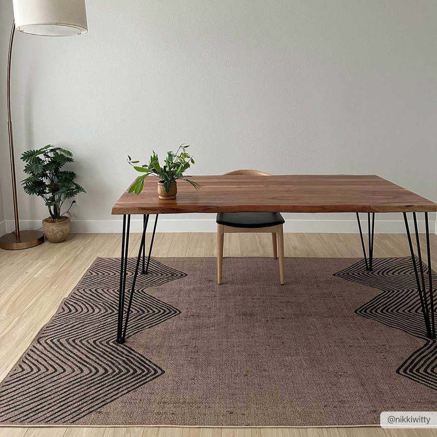 Dining room with wood table and Suzy Washable Jutely Rug in mocha with black geometric pattern. Farmhouse style. Roomscene-Rectangle