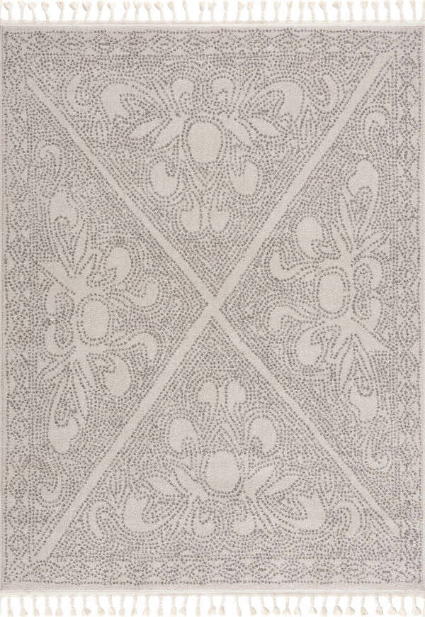 Close-up of the Birdwood Cream & Brown Area Rug, showcasing its bohemian floral pattern and tassel fringe. Design-Rectangle