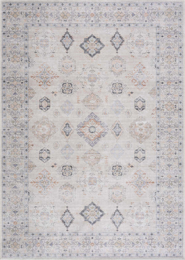 Close-up of Beige Beckett Washable Rug with a traditional, vintage-inspired pattern in beige, blue, and brick red. Design-Rectangle