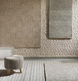 Textured rug display featuring the Yarrabilba Area Rug, showcasing hand-woven designs in ivory, charcoal, and off-white hues. Texture