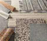 Assorted area rugs: Hansell rug in charcoal, green, and ivory, plus other textures and colors. Texture
