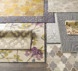 Variety of hand-tufted wool rugs: Elsu Brown Beige floral rug, geometric rug, and abstract rug designs in neutral tones. Styleshot