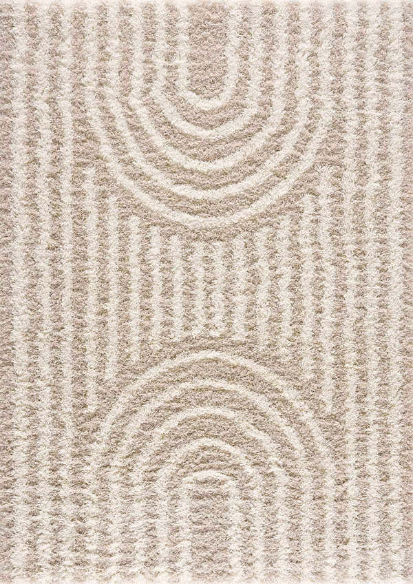Close-up of the Emmly Shag Area Rug. Shag rug with a geometric pattern in white thatch, light peach, and nutmeg hues. Design-Rectangle-5373