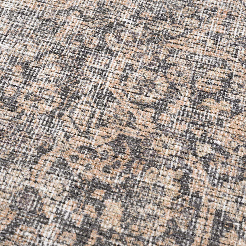 Close-up of the Orsin Washable Area Rug, showcasing its farmhouse-style pattern in beige, gray, and white hues. Texture