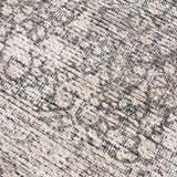 Close-up of the Odele Washable Area Rug, medium gray farmhouse style with a traditional pattern and soft chenille texture. Texture