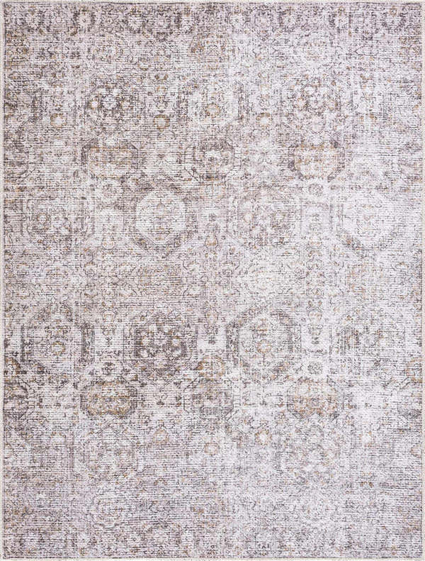 Close-up of the Washable Parkerfield Area Rug in gray, silver, and mustard tones with a traditional, distressed pattern. Design-Rectangle-537