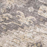 Close-up of the Keola Washable Area Rug, showing the chenille texture and farmhouse-style gray and beige pattern. Texture