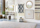 Eclectic entryway with Atulayan Premium Rug, console table, mirrors, and wall art. Bohemian style. Styleshot
