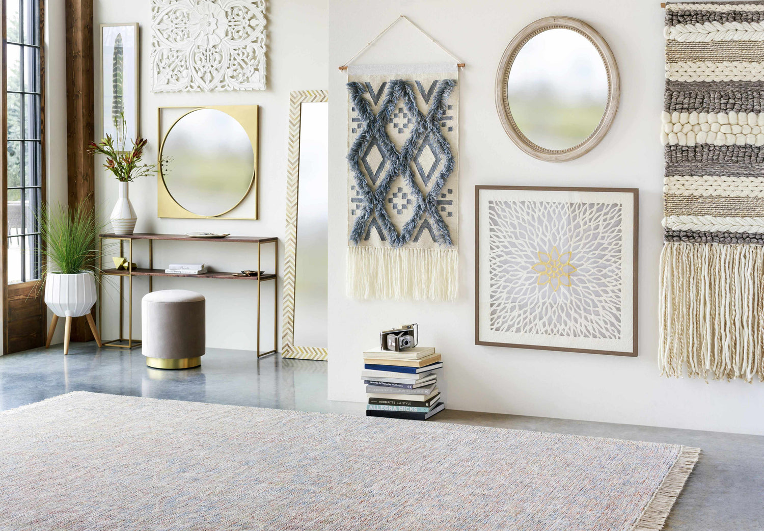 Eclectic entryway with Atulayan Premium Rug, console table, mirrors, and wall art. Bohemian style. Styleshot
