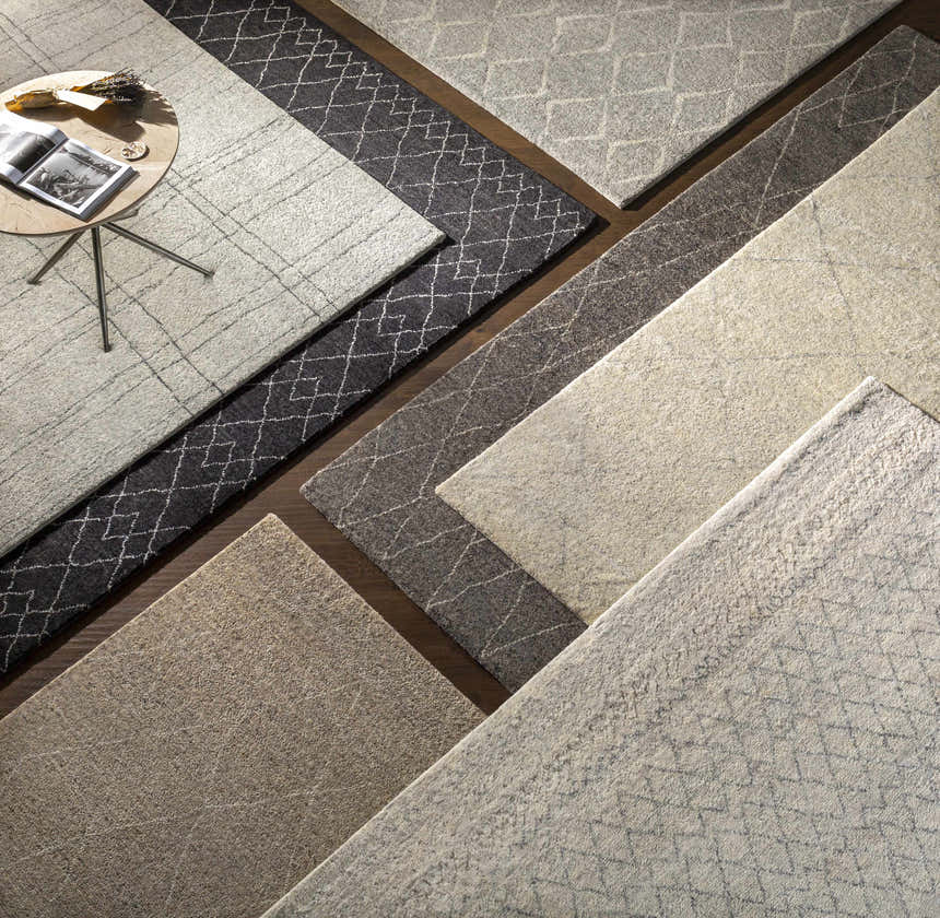 Overhead shot of Caramoran Premium Rugs in beige, cream, gray, and tan with contemporary, farmhouse, and transitional styles. Styleshot
