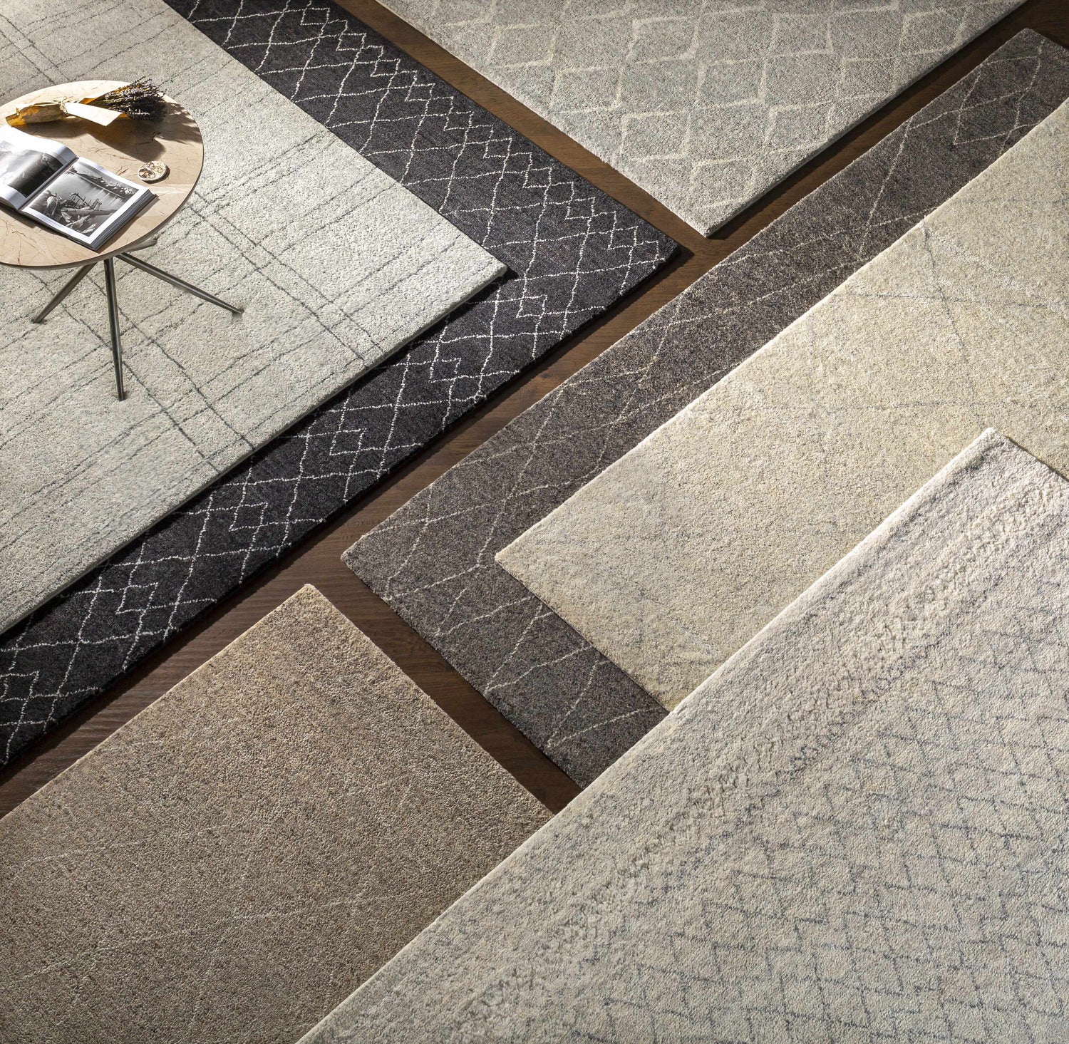 Overhead shot of Caramoran Premium Rugs in beige, cream, gray, and tan with contemporary, farmhouse, and transitional styles. Styleshot