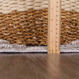 Close-up of Serkomen High-Low Area Rug showing texture, pile height, and woven construction with a ruler for scale. Pile