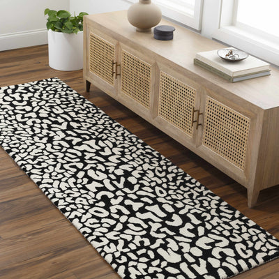 Akeem Leopard Print Area Rug