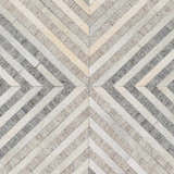 Close-up of the Akiye Area Rug showcasing its geometric pattern in beige, cream, and gray leather and viscose. Swatch