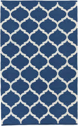 Close-up of the Alcalde Area Carpet. Hand-woven cotton rug in bright blue with an ivory quatrefoil pattern. Design-Rectangle-58