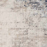 Close-up of the Alcove Abstract Area Rug showing its dark blue, gray, and ivory contemporary design. Swatch
