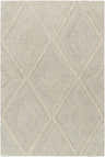 Close-up of the hand-tufted Alick Area Rug. Beige and beachhouse colors with a geometric diamond pattern. 100% wool texture. Design-Rectangle-576