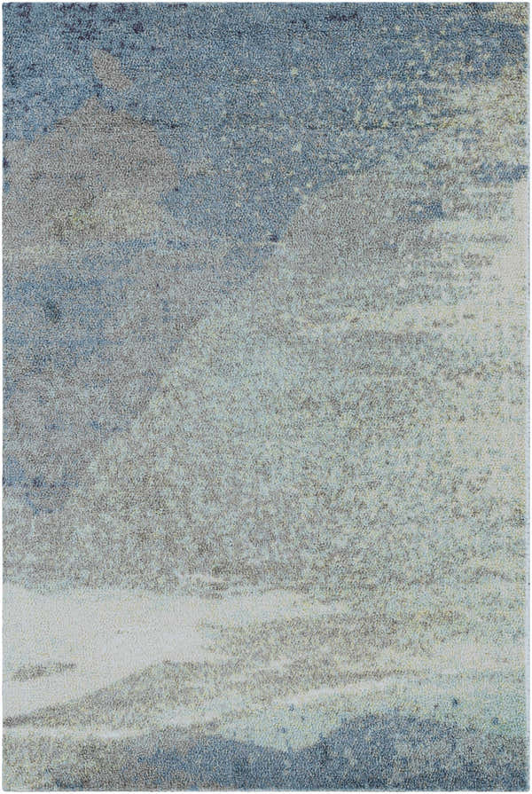 Close-up of the Alvaton Abstract Blue Rug showing its textured, machine-woven design in shades of blue, gray, and light beige. Design-Rectangle-23